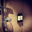 Wall-mounted DUO bottle holder